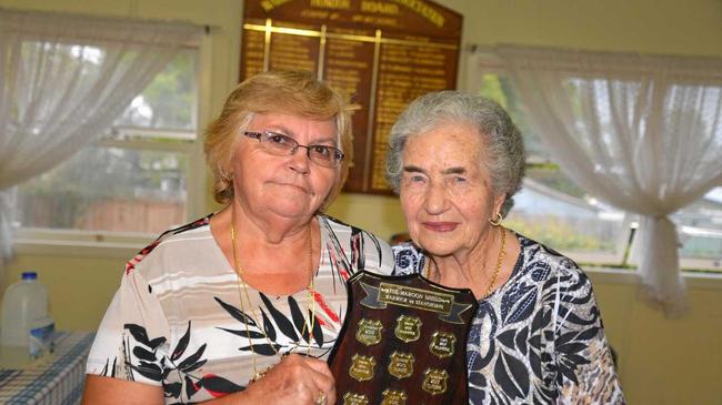 Captains Margaret Ternanov (Warwick) and Geraldine Torrisi (Stanthorpe) with the Maroon Shield for inter-town indoor bowls competition. Picture: Gerard Walsh