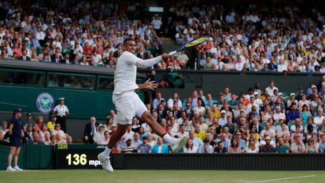 Kyrgios lost to Rafael Nadal in the second round of Wimbledon in 2019, playing in a long white arm sleeve to hide evidence of self-harming. Picture: AFP