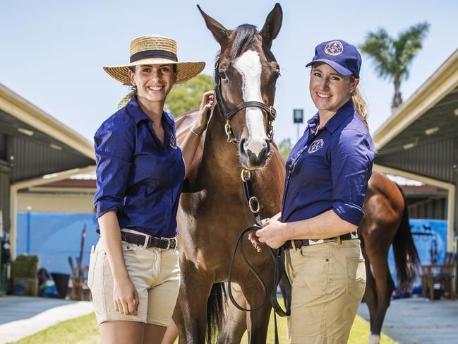 Georgia Griffin (left) and Lana Gleeson (right) with the Written Tycoon-Makybe Diva filly. Picture: Nigel Hallett
