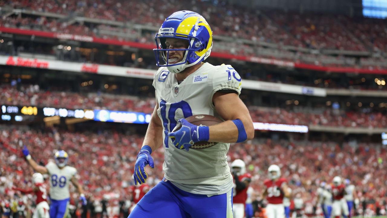 GLENDALE, ARIZONA - SEPTEMBER 25: Wide receiver Cooper Kupp #10 of the Los Angeles Rams scores on a 20-yard rushing touchdown against the Arizona Cardinals during the first half of the NFL game at State Farm Stadium on September 25, 2022 in Glendale, Arizona. The Rams defeated the Cardinals 20-12. Christian Petersen/Getty Images/AFP