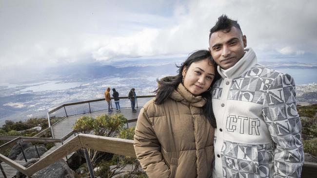 Aditi Shahi and Shyam Maharjan of Sydney at the kunanyi/ Mount Wellington summit. Picture: Chris Kidd