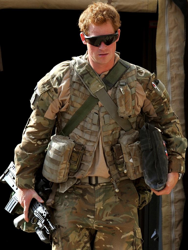 Prince Harry serving in Afghanistan, where he was serving as an Apache helicopter pilot/gunner. Picture: AFP Photo/Pool/John Stillwell