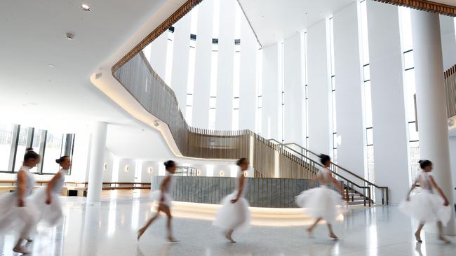 Young dancers from GB Dance Co. in Chipping Norton explore the foyer of the new Sydney Coliseum. Picture: Sam Ruttyn