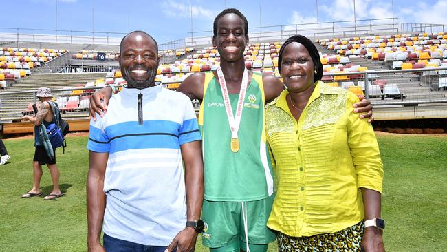 A beaming Under 14 High Jumper record breaker Alikana Malish with mum and dad, Hassan and Flowra. Picture, John Gass