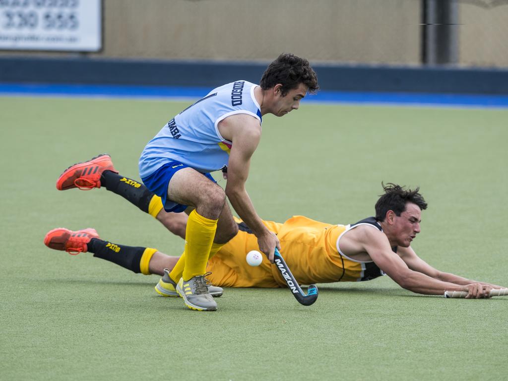Josh Bidgood (left) of Toowoomba 1 against Sunshine Coast in Hockey Queensland Championships at Clyde Park, Sunday, May 2, 2021. Picture: Kevin Farmer
