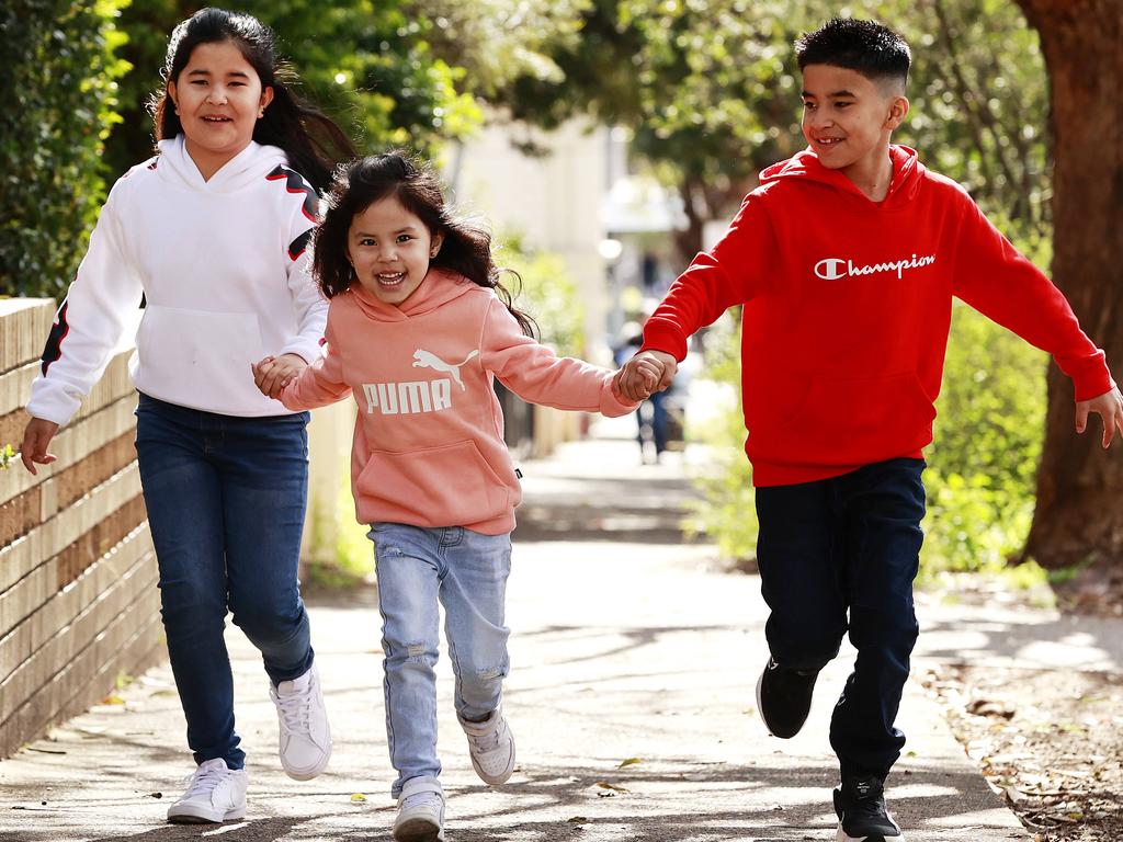 Siblings Madina, 5, and twins Zahra and Ali Najibulla, 9, live in Auburn which census data shows is Australia’s healthiest region. Picture: Tim Hunter