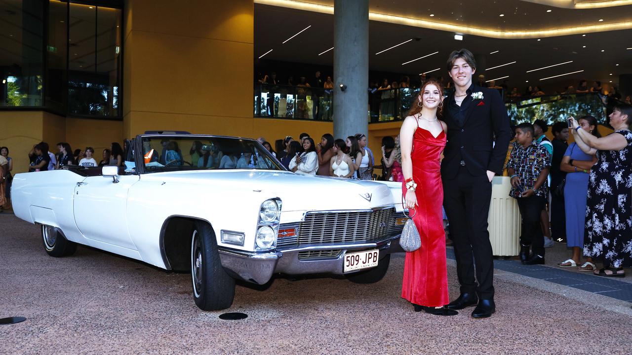 Darcey Searle and Geordie Wood arrive at the Peace Lutheran College formal evening at the Cairns Convention Centre. Picture: Brendan Radke