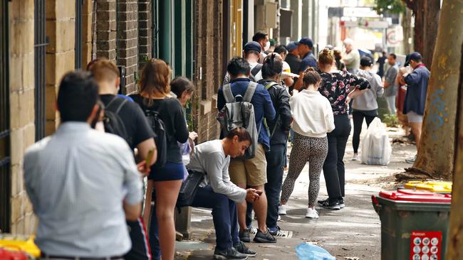 Lines of unemployed people outside Surry Hills Centrelink last week as the COVID-19 pandemic causes massive job losses. Picture: Sam Ruttyn