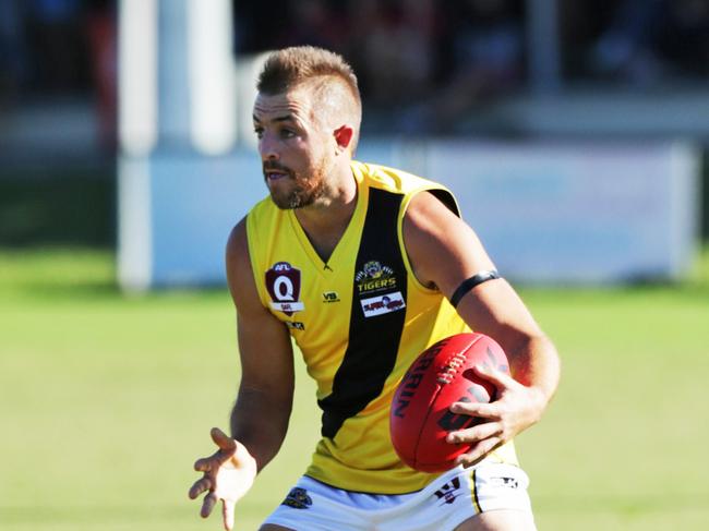 Matthew Lappin in a 2015 QAFL game for Labrador. The Tigers would win a historic premiership that year. Picture: Tim Marsden.