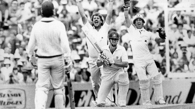 Ian Botham (L) and wicketkeeper Bob Taylor appeal for wicket of batsman John Dyson during a test match.