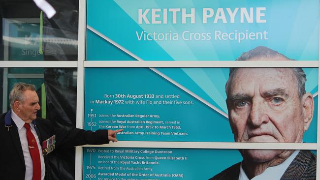 Keith Payne with his display that he unveiled at the Mackay Airport Hall of Fame induction ceremony for Keith Payne VC and Cooper Whitestyles on Friday, December 9, 2022. Picture: Andrew Kacimaiwai.