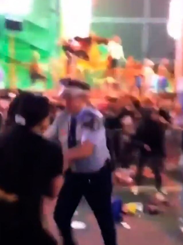 Vision showing a police officer attempted to stop the fight. Picture: 2GB