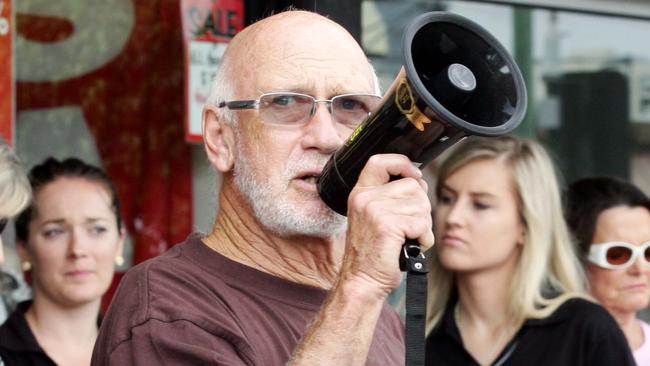 Chevron Island business owners protesting about a proposed revamp of the Shopping Village which they say will be disruptive and take away parking. Frank Goldstein from Goldstein's Bakery with other protesters.