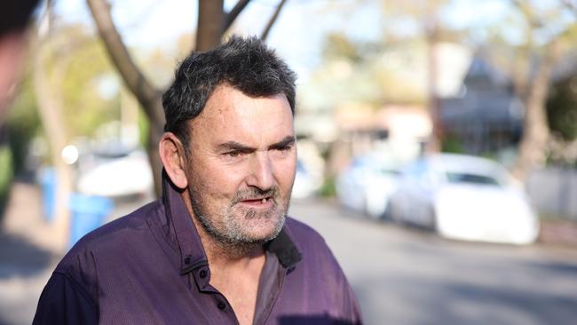 Neighbour Paul Checkley speaks to the media outside the scene of a fatal house fire at Parkside on Sunday afternoon. Picture: Tom Huntley