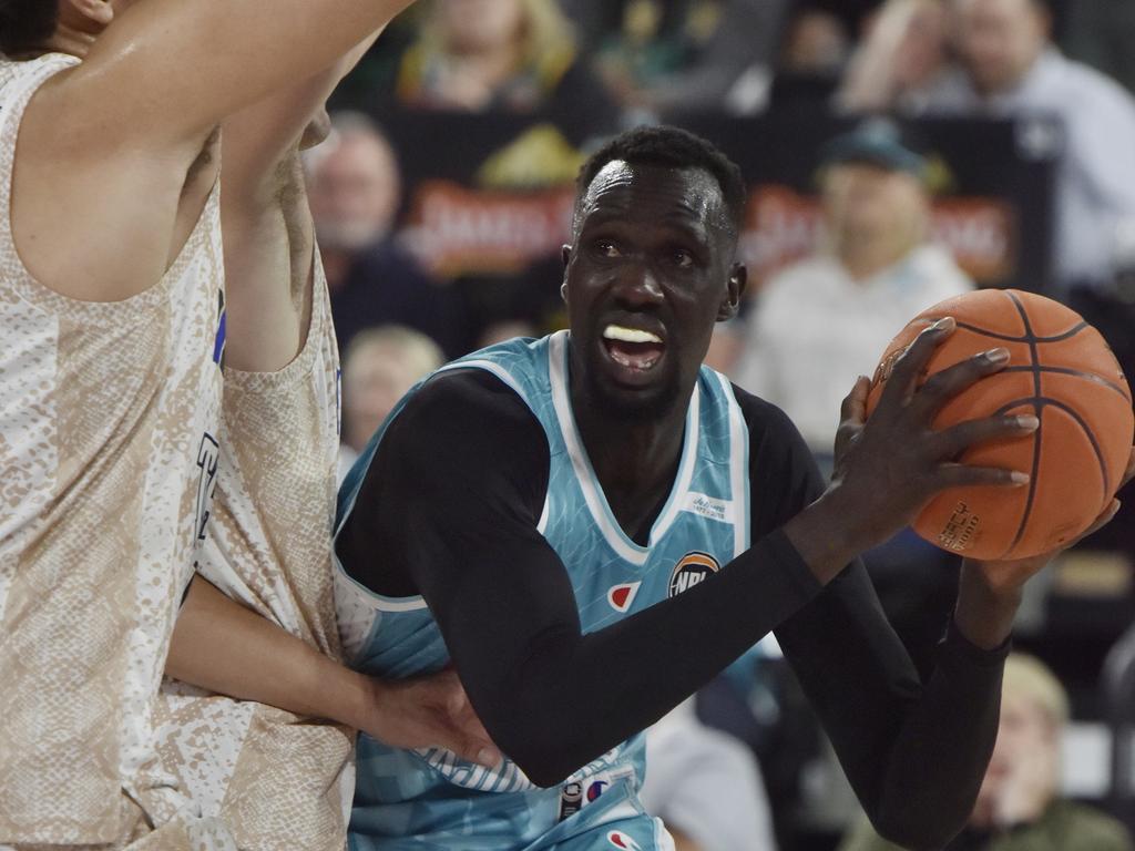 Majok Deng of the Jackjumpers looks for space under the basket. Picture: Simon Sturzaker/Getty Images