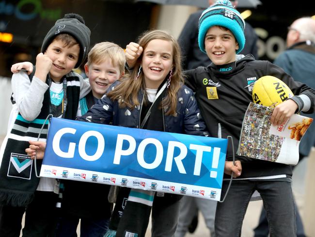 AFL PRELIMINARY FINAL - PORT ADELAIDE versus Richmond at Adelaide Oval. Fans arriving for the game. Young Port fans, (LtoR) Louca Papas,7, Charlie Bode,6, Ava Papas,8, and Felipe Papas,11. 16 October 2020. Picture Dean Martin