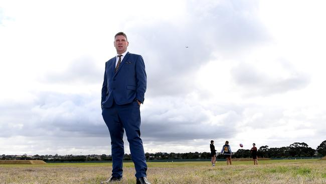 Hawthorn Football Club CEO Justin Reeves poses for a photo at the proposed site of the Kennedy Community Centre at Dingley.