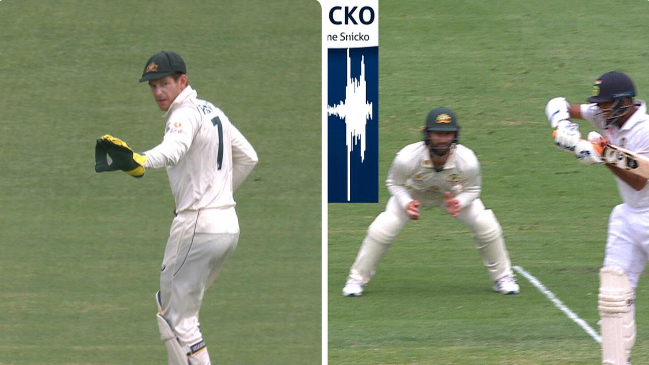 Tim Paine dropped a chance off Mitch Starc's bowling.