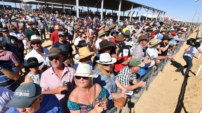 People come from around Australia to experience the Birdsville races. Picture: AAP