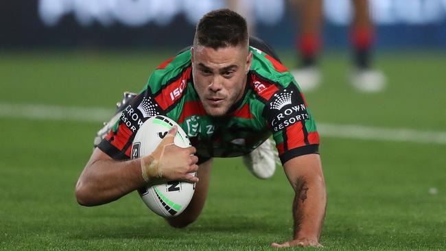 Souths Corey Allan scores a try during the Souths v Roosters NRL match at ANZ Stadium, Homebush. Picture: Brett Costello