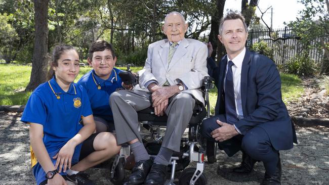 Bass Hill Public School captains Daniel Albassit and Lina Hussein with Dick Payten and Blaxland MP Jason Clare in 2018. Picture: Matthew Vasilescu