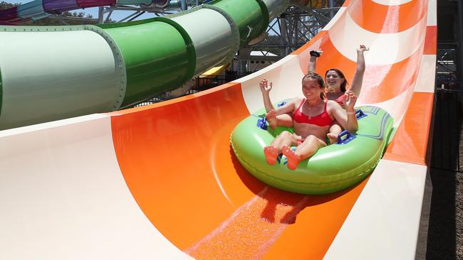 Wet’n’Wild lifeguards Breanna Cummins and Sofia Silvestri test ride the new slide which opened Friday. Picture: Glenn Hampson