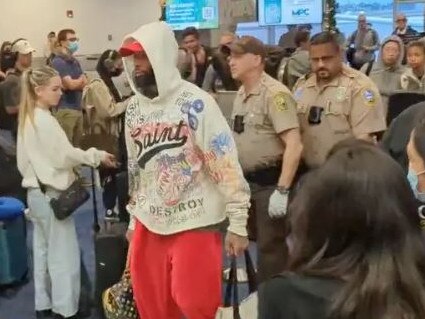 A video posted on Twitter showed Odell Beckham Jr being escorted by police after he was kicked off a flight in Miami on Sunday. Picture: Twitter/@TheMalibuArtist