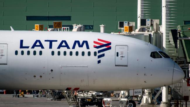 A Latam airlines plane sits on the tarmac at Santiago International Airport. Picture: AFP