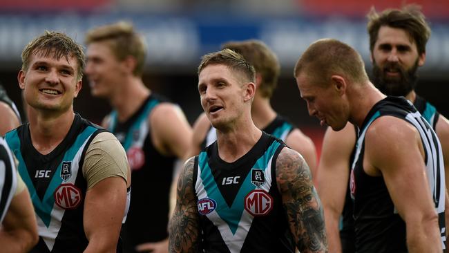 Ollie Wines, Hamish Hartlett and Tom Clurey after Port’s win over GWS. Picture: Matt Roberts (Getty).