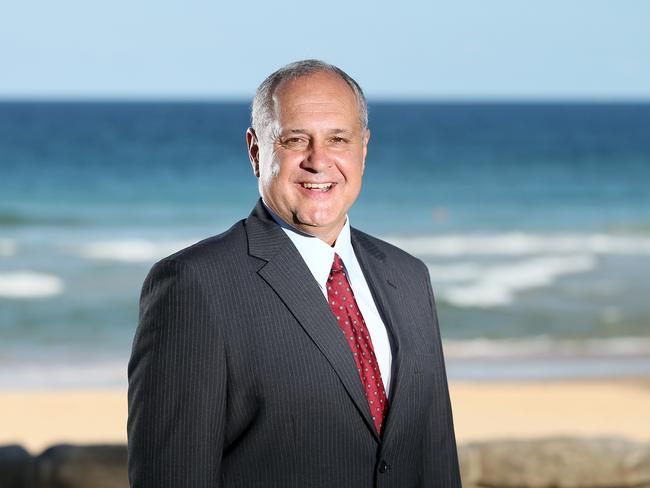 Liberal party member Walter Villatora poses during a photo shoot at the beach near his Manly home. Picture: Troy Snook