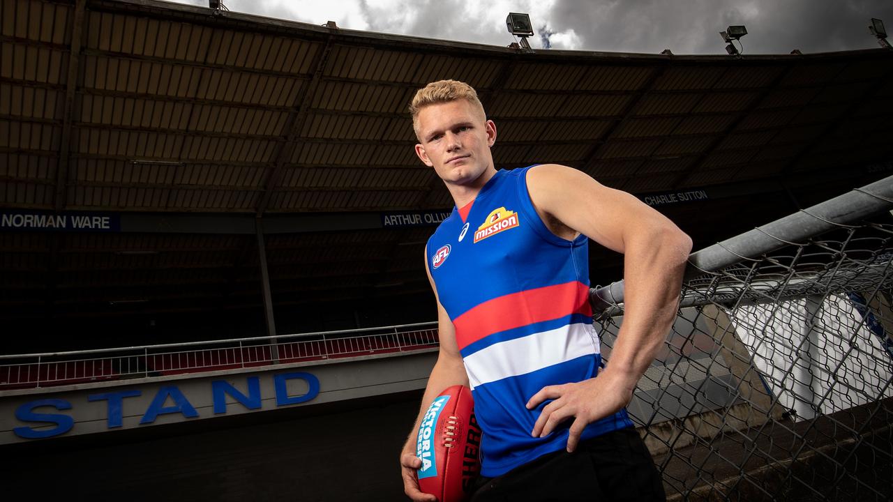 Collingwood and the Western Bulldogs are in a standoff over Adam Treloar’s contract.