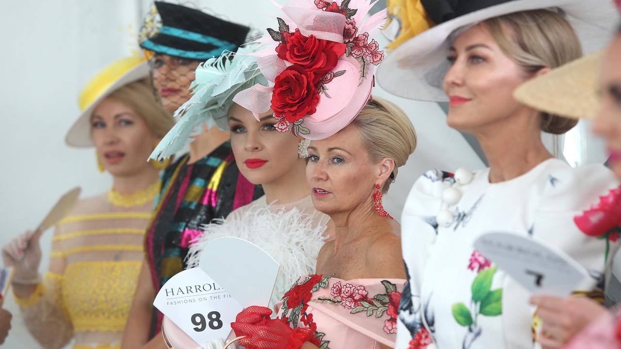 Fashions in the field finalists wait in line during Gold Coast Magic Millions Race Day at the Gold Coast Turf Club. Photo: Jono Searle