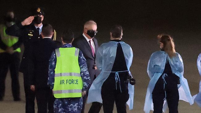 Prime Minister Scott Morrison arrived back into Canberra on Sunday evening. Picture: Newswire/Gary Ramage