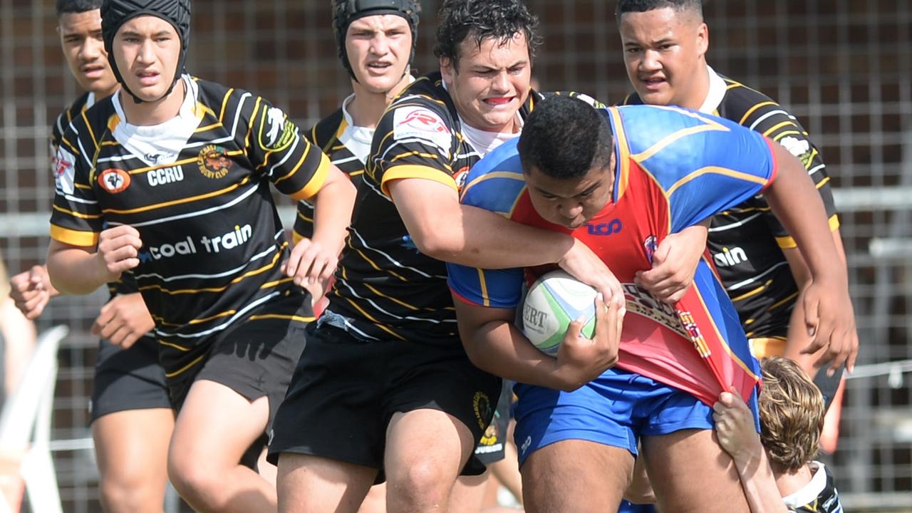 Nogoa Red Claws forward Selemaia Taungahihifo tries to break through the Cap Coast defence in the Rugby Capricornia under-16 grand final on Saturday. Photo: Jann Houley