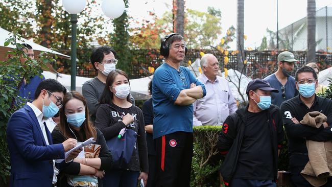 Prospective buyers attend an auction in Sydney. Picture: Getty Images