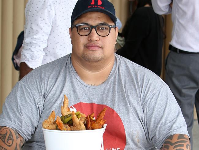 Belle's Hot Chicken - Chef Morgan McGlone with a basket of chicken. Picture by Chris Pavlich.