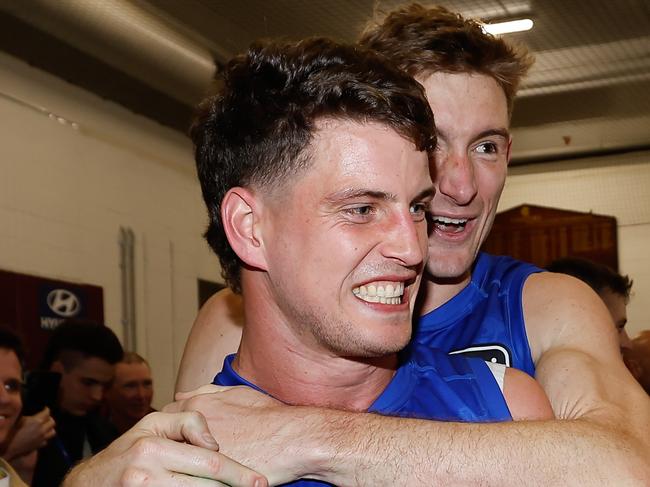 MELBOURNE, AUSTRALIA - SEPTEMBER 21: Jarrod Berry and Harris Andrews of the Lions celebrate during the 2024 AFL Second Preliminary Final match between the Geelong Cats and the Brisbane Lions at The Melbourne Cricket Ground on September 21, 2024 in Melbourne, Australia. (Photo by Dylan Burns/AFL Photos via Getty Images)