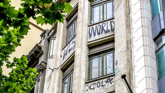 The 1930s building at 123 Swanston St was built in the 1930s. It is now untenanted except for bottom floors, with graffiti on top three levels.