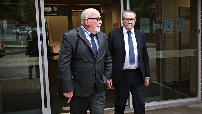 High range drink driver Kelvin Smith (right) leaving Waverly Court with a supporter on the 24th of February. Picture: Adam Yip