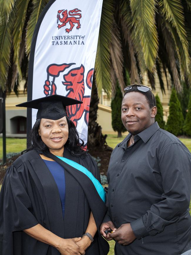 Muchanetsa and Mark Mutakiwa at the UTAS Graduation at Launceston. PICTURE CHRIS KIDD