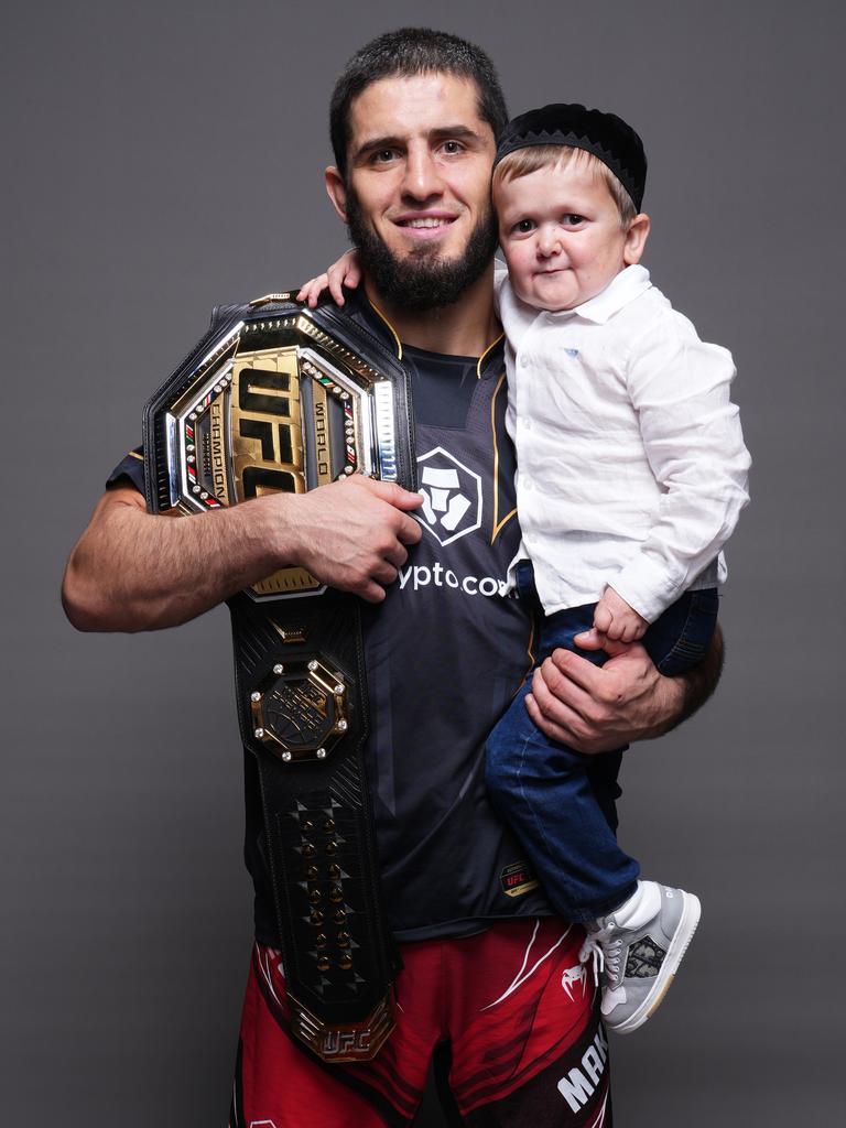 Islam Makhachev of Russia poses for a portrait with Hasbulla Magomedov after winning the UFC lightweight championship. (Photo by Mike Roach/Zuffa LLC)