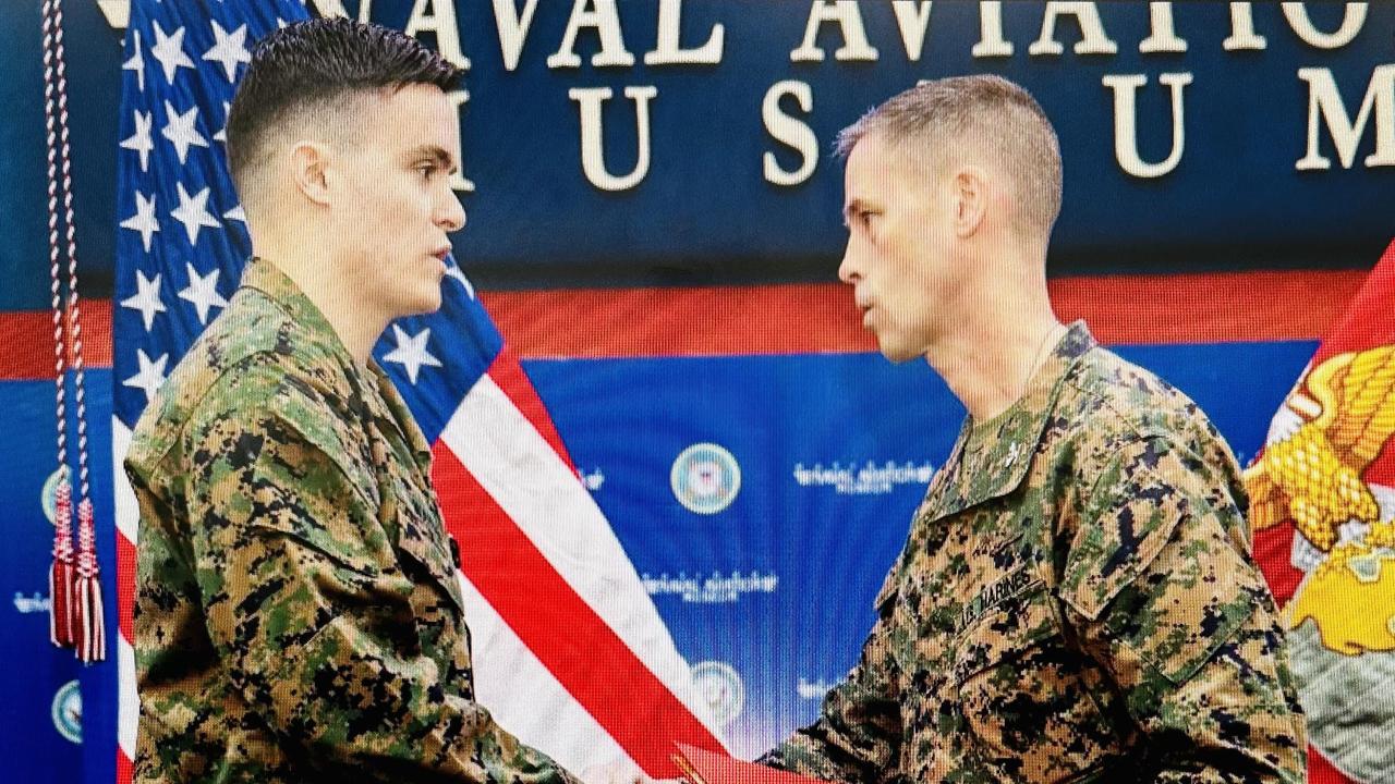 PICTURE CAPTION: Marine Corps Capt. Joshua C. Watson is awarded the navy and Marine Corps Medal at the National Naval Aviation Museum, Pensacola, Florida on Feb. 28, 2025. Marine Corps photo.