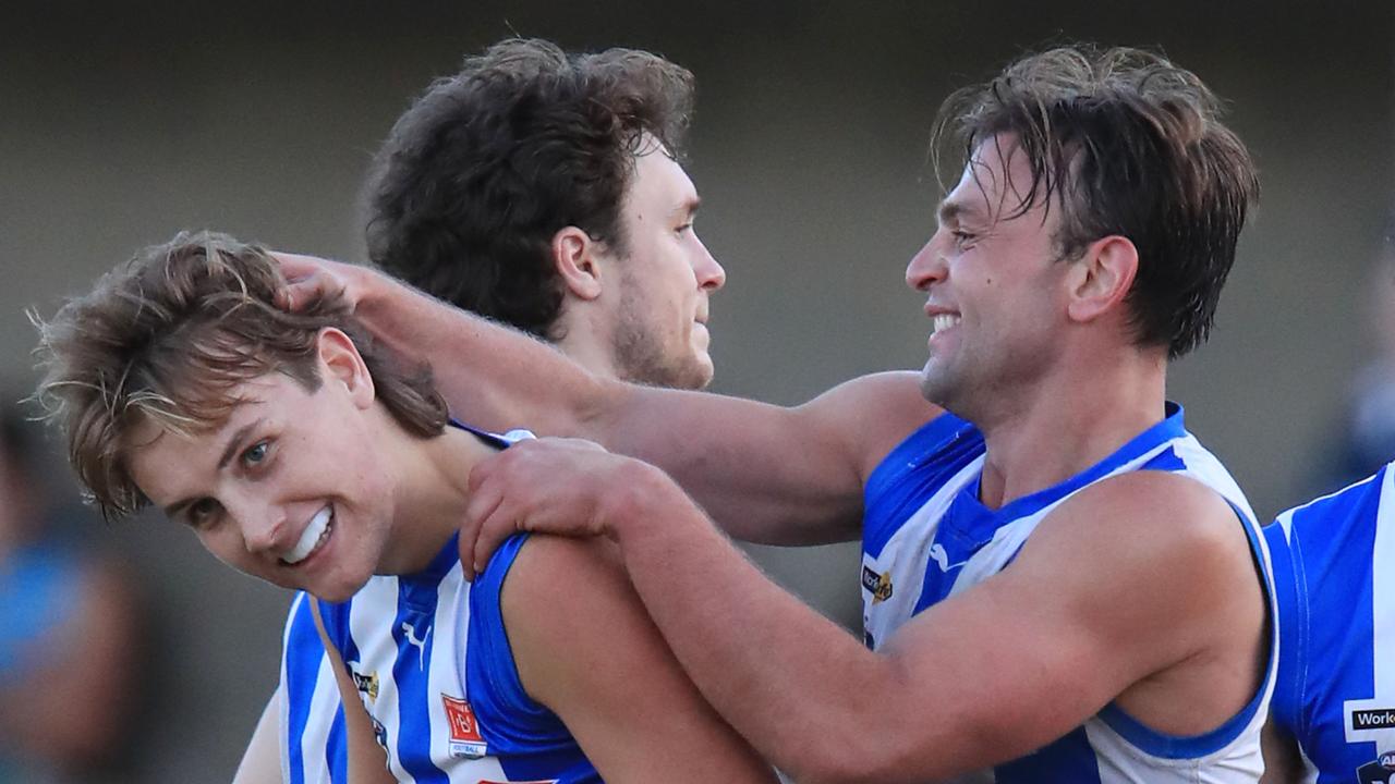 Anglesea’s Noah Collins celebrates a goal with coach Jordan Keras against Geelong Amateur. Picture: Mark Wilson