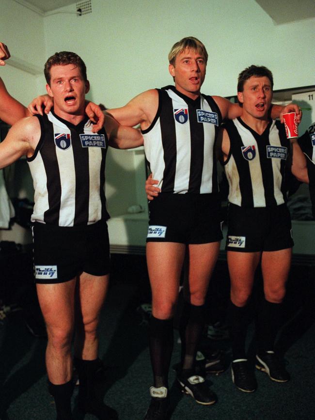 Richard Osborne (middle) with Collingwood teammates Paul Williams and Tony Francis in 1997.