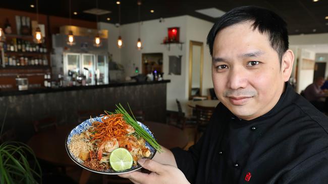 Thomas Ng from Nu Thai holding a plate of pad thai. Picture: Dean Martin