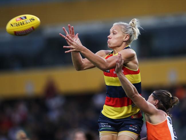 AdelaideÕs Erin Phillips in front of GiantÕs Pepa Randall during AFL W match GWS Giants v Adelaide Crows at Blacktown. Picture. Phil Hillyard