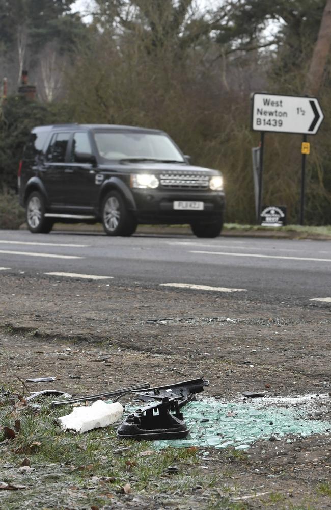 Broken glass and car parts on the road side near to the Sandringham Estate, England, where Prince Philip was involved in a road accident. Picture: AP