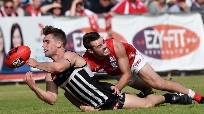 Port Adelaide's William Snelling releases a handpass. Picture: Tom Huntley