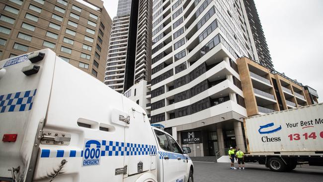 Police vehicle at the Meriton Suites in Parramatta a night after the fatal stabbing. Picture: Julian Andrews