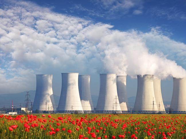 Nuclear Power plant with red field and blue sky